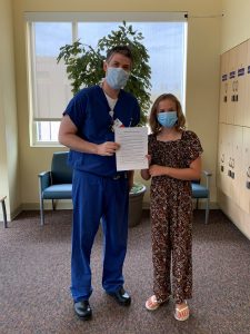 Photo of article author, Everly Johnson, and Dr. Puricelli