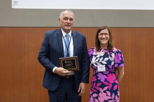Dr. Lee Faucher accepting his award at the UW SMPH Medical Education Day