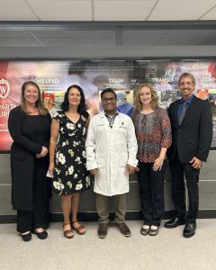 Drs. Elizabeth Plovanich, Jill Migon, Audra Smith and John Finnell stand with Dr. Naren Patel for a picture